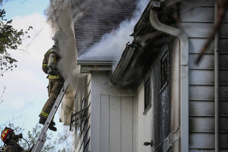 The Crystal Lake Fire Rescue Department responds at shortly before 5 p.m. Friday, April 21, 2023, to a fire at 3004 Walkup Road in Crystal Lake.