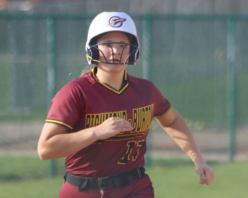 Richmond-Burton’s  Gabby Hird darts toward home to score in varsity softball on Tuesday, April 22, 2025, at Marengo High School in Marengo.