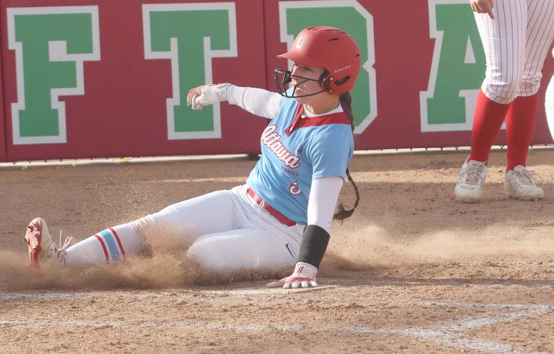 Ottawa's Avery Leigh touches home plate after sliding safe into the bag against L-P on Wednesday, April 29, 2026 at the L-P Athletic Complex in La Salle.