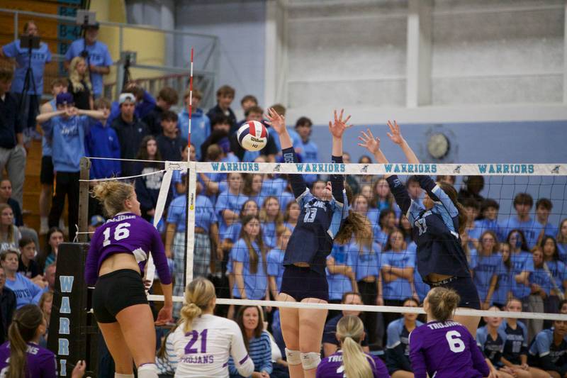 Downers Grove North's Jenny Buchler delivers a kill shot against Downers Grove South at the Class 4A Willowbrook Sectional Final on Thursday, Nov.7,2024 in Villa Park.