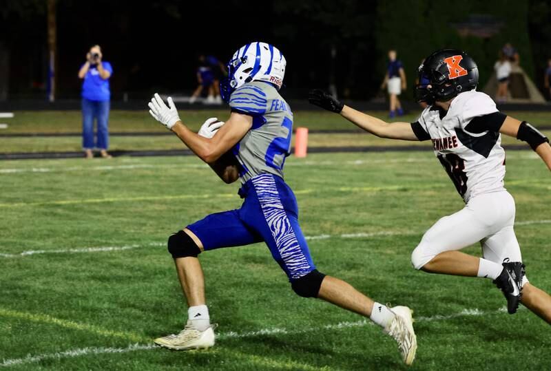Princeton freshman Reece Pearson scampers for a 9-yard touchdown in the TIgers' 63-12 win over Kewanee on Friday.