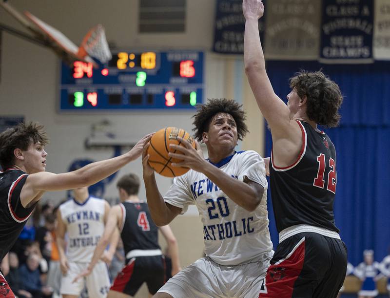 Newman’s Tyson Williams works against Hall’s Jack Jablonski Friday, Jan. 17, 2025 at Newman High School.