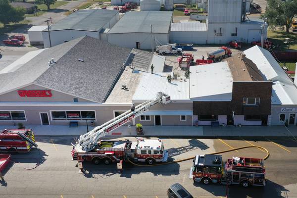  Photos: Firefighters rush to Grassers Heating and Plumbing Fire