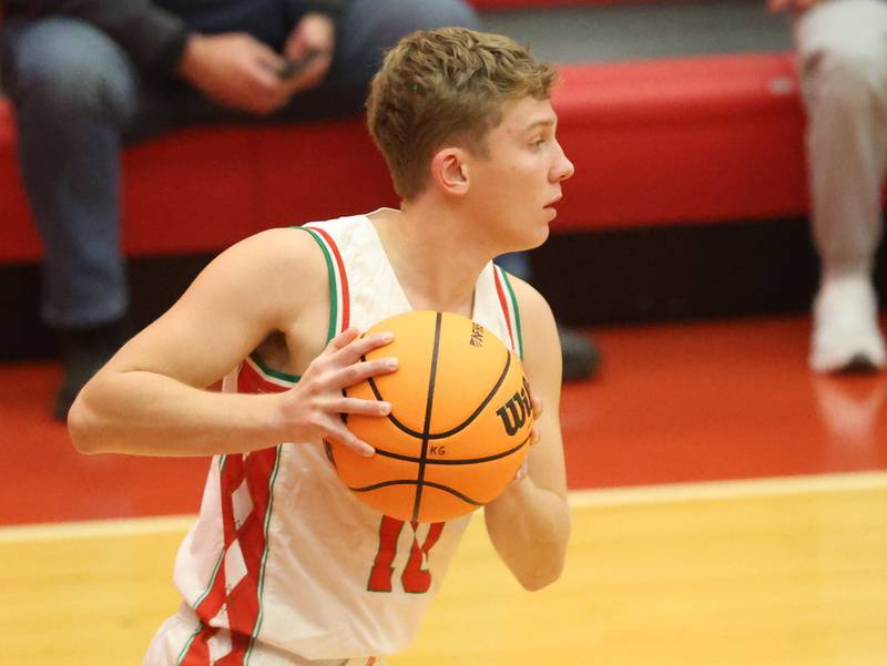 L-P's Landon Harty looks to pass the ball during the Dean Riley Shootin' The Rock Thanksgiving Tournament on Monday Nov. 24, 2025 in Kingman Gymnasium at Ottawa High School.