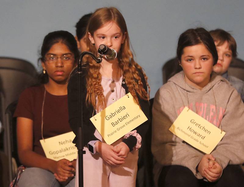 Gabriella Barbieri of Prairie Grove Elementary School competes in the McHenry County Regional Office of Education's 2023 spelling bee Wednesday, March 22, 2023, at McHenry County College's Luecht Auditorium in Crystal Lake.