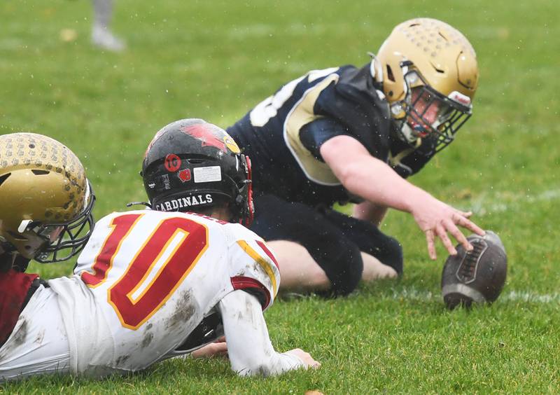 Polo's Wyatt Plachno (75) recovers a fumble against St. Anne on Saturday, Nov. 8, 2025 at Polo High School. The Marcos won the game 46-14.