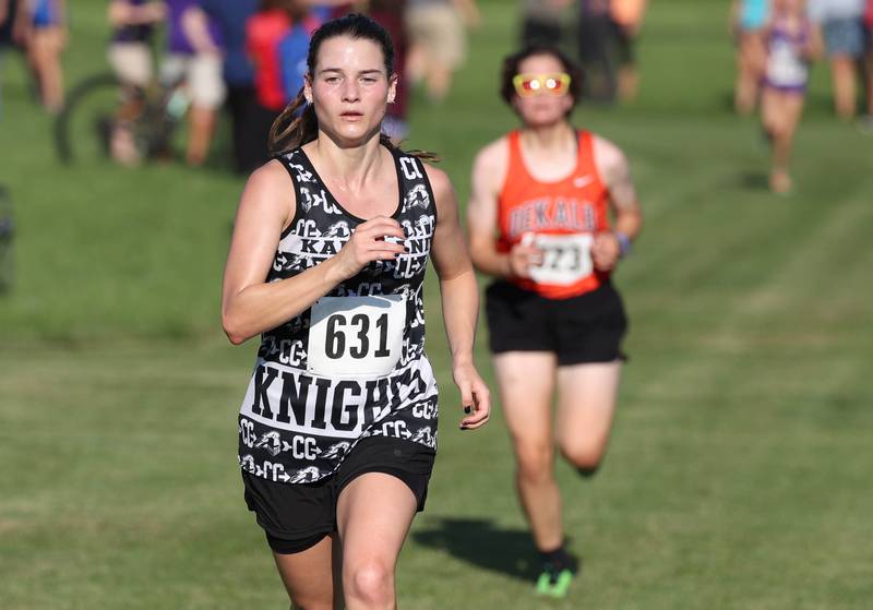 Kaneland’s Danielle Bower finishes the varsity race Tuesday, Sept. 2, 2025, during the Sycamore Cross Country Invitational at Northern Illinois University in DeKalb.