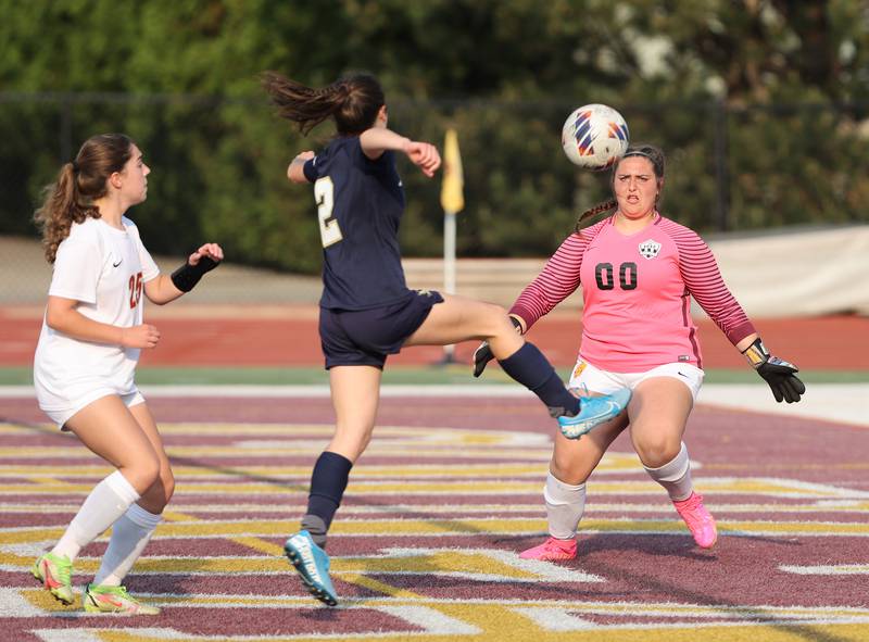 Richmond-Burton's goalkeeper Taylor Labay (00) goes for a stop during the IHSA Class 1A girls soccer super-sectional match between Richmond-Burton and IC Catholic at Concordia University in River Forest on Tuesday, May 23, 2023.