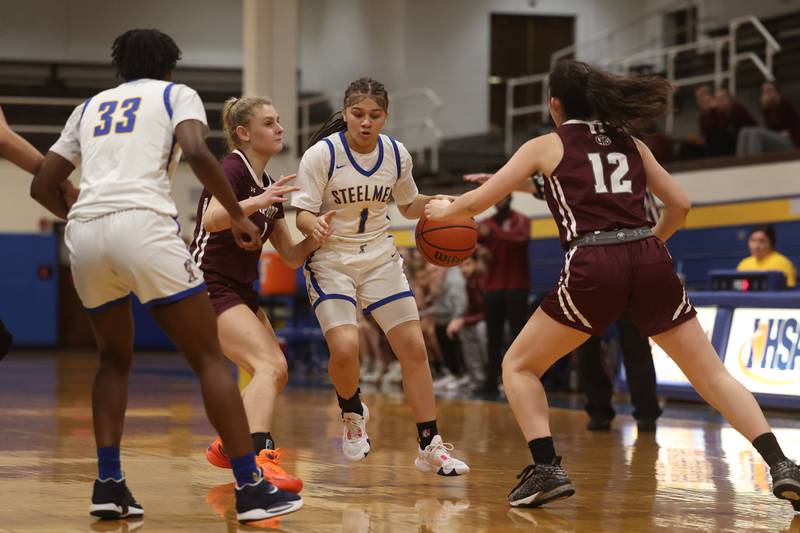 Joliet Central’s Ellinana Fowler looks to make a play against Lockport.