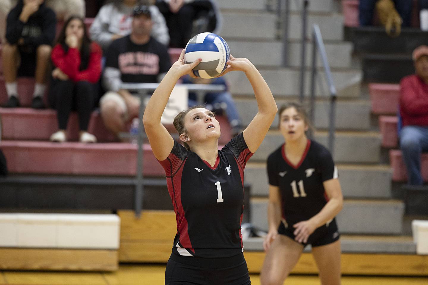 Sauk Valley’s Gabby Jones sets the ball Tuesday, Oct. 18, 2022 against Carl Sandburg College.