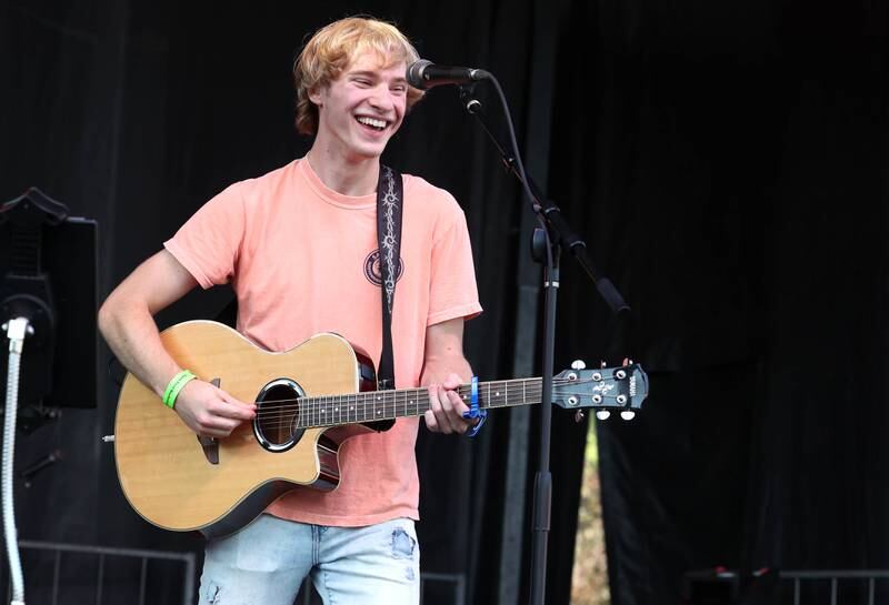 Matt Ripsch has some fun on stage as he kicks off the entertainment Friday, Aug. 23, 2024, during the DeKalb Corn Fest.