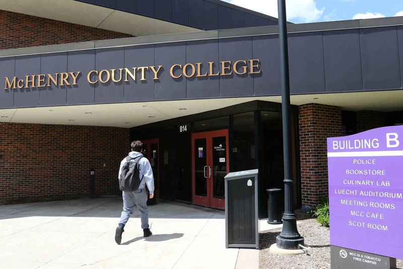 A student walks into campus at McHenry County College on Tuesday, May 11, 2021 in Crystal Lake.