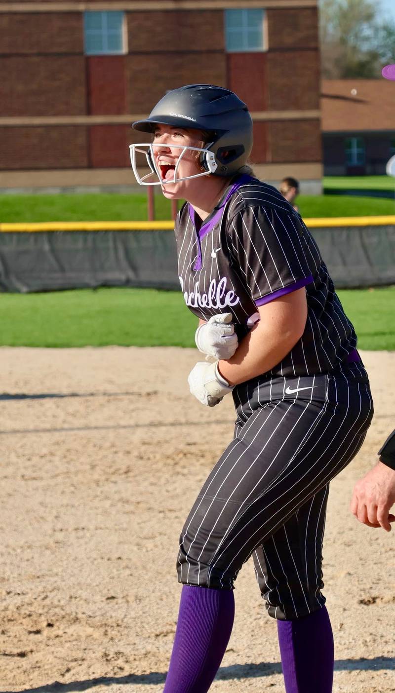 Rochelle's Madigan Williams celebrates a base hit during the Hubs' game with Somonauk.