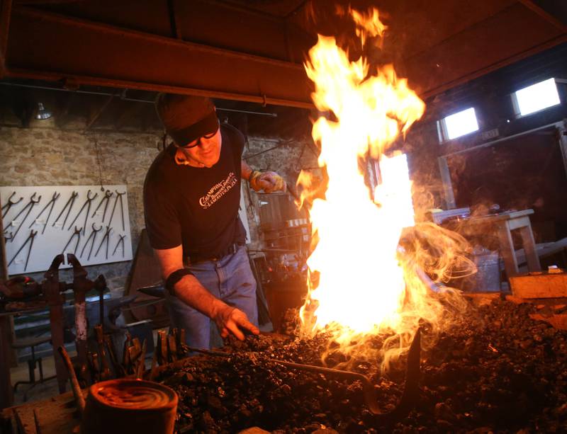 Doug Eichert of Somonauk performs demonstrations in the La Salle County Historical Socity Blacksmith Shop during the 54th annual Burgoo on Sunday, Oct. 13, 2024 downtown Utica.