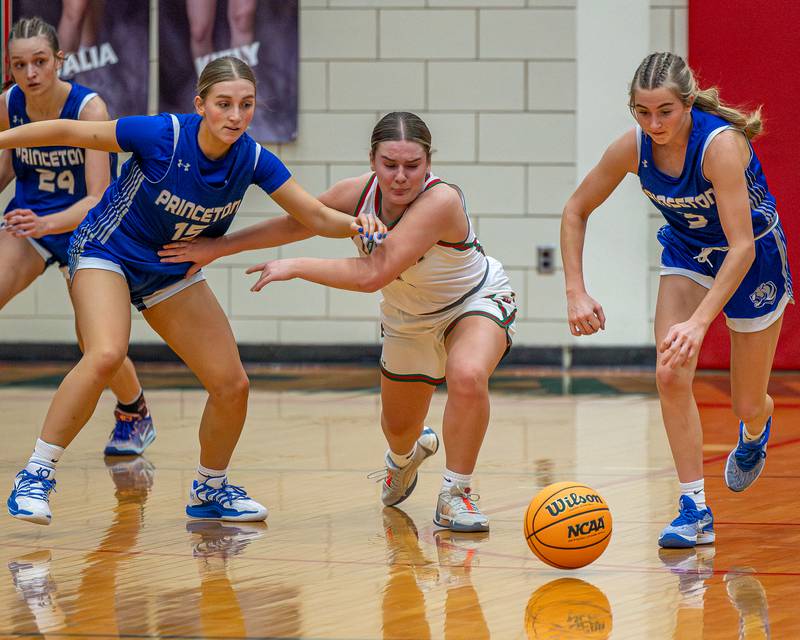 L-P's Emma Jereb (5) along with Ava Munson (15) of Princeton  and teammate Kiyrra Morris (5) dive for ball on Saturday, Feb. 7, 2026 in Sellett Gymnasium at L-P High School.