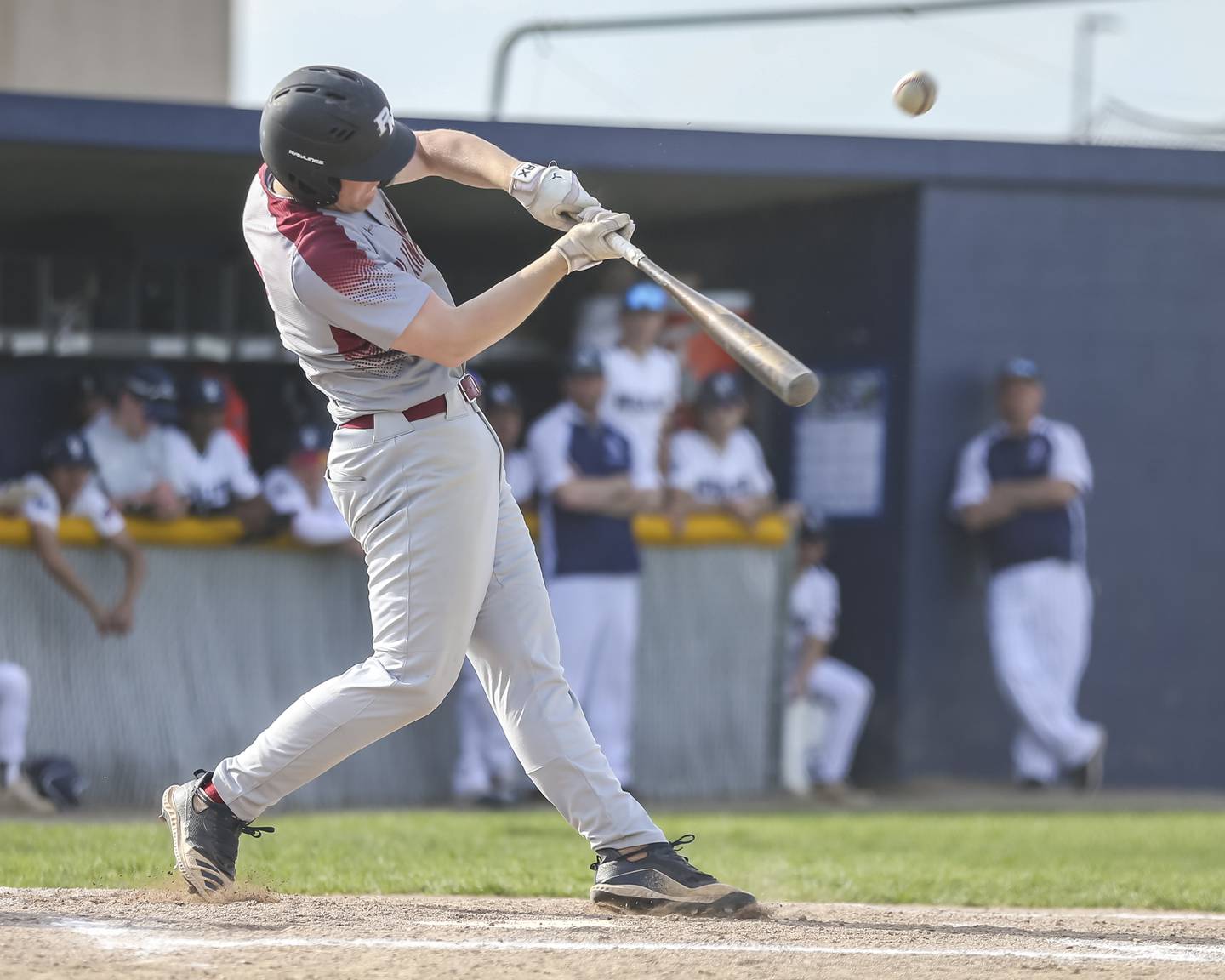 Plainfield North's Gavin Persson (7) swings at a pitch during a baseball game between Plainfield North and Oswego East, Monday, April 28, 2025 in Oswego.