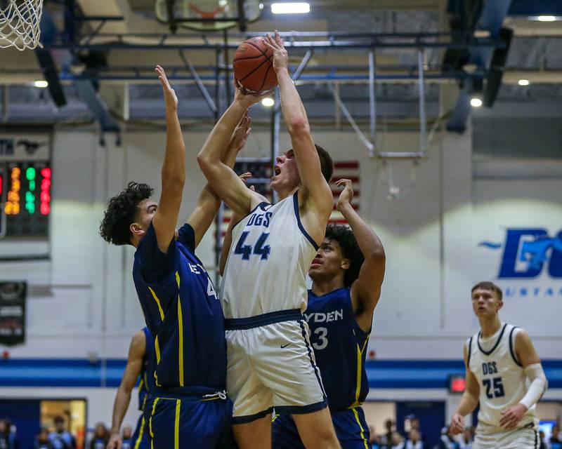 Downers Grove South's Justin Sveiteris (44) puts up a shot during basketball game between Leyden at Downers Grove South. Feb 9, 2024.