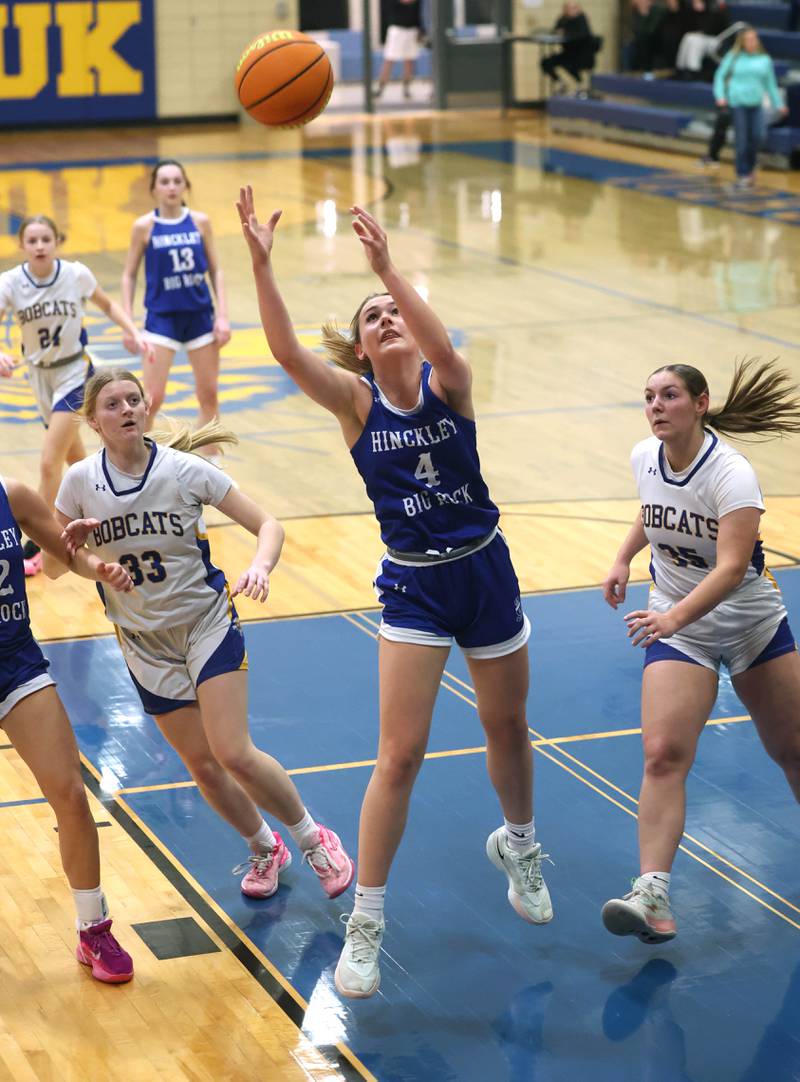 Hinckley-Big Rock's Amelia Michels grabs a rebound between Somonauk/Leland’s Abby Hohmann (left) and Kennedy Barshinger during their game Thursday, Jan. 15, 2026, at Somonauk High School.
