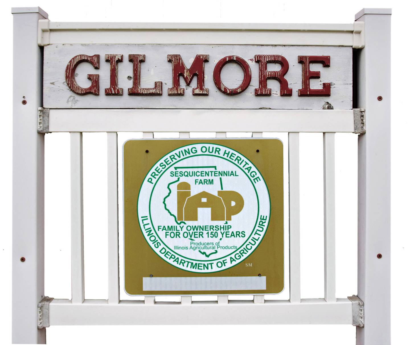 A plaque from the Illinois Department of Agriculture recognizes the Gilmore farm as being a sesquicentennial family farm.