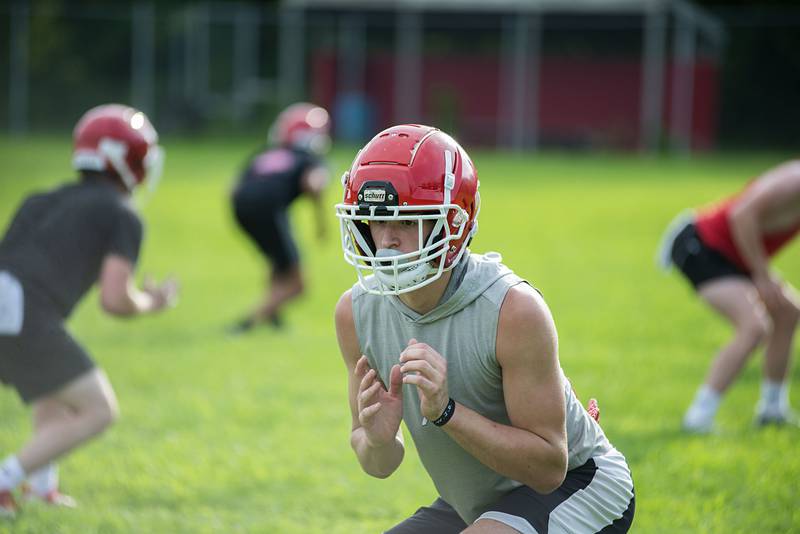 Morrison football players run through drills Tuesday, July 26, 2022. The team will open the season against Newman on August 26.