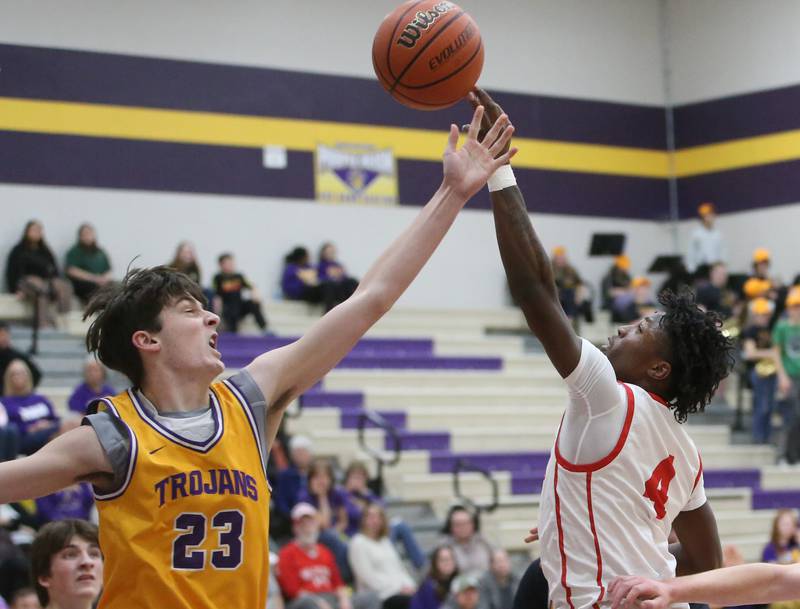 Mendota's Dane Doyle misses a rebound as Ottawa's Keevon Peterson beats him to the ball on Tuesday, Feb. 13, 2024 at Mendota High School.