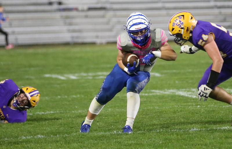 Princeton's Brennen Emmett is met by Mendota's Wyatt Ossman on Friday, Oct. 10, 2025 at Bryant Field in Princeton.