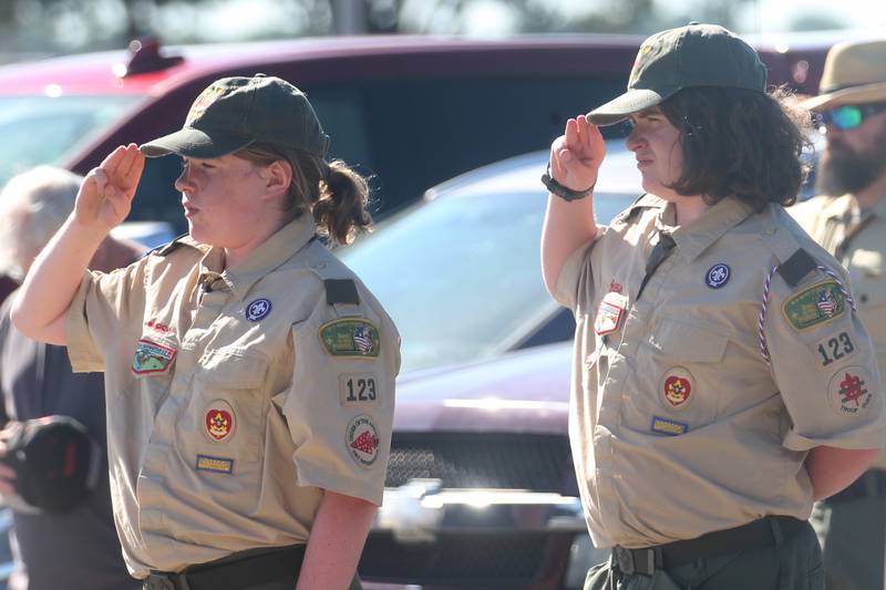 Zayden O'Dell and his brother Desmond salute the American Flag during a Flag Retirement Ceremony on Friday, June 14, 2024 at Veterans Park in Peru.  The ceremony began as a Eagle Scout project for area boy scouts about 30 years ago. Boy Scouts from Peru's Troop 123 and Peru Cub Scouts from Pack 3709 were on hand to help with the ceremony. When an American Flag gets torn and tattered, Flag etiquette requires it to be proper disposed in a burning cauldron.