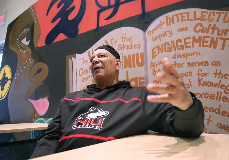 Derrick Smith, an academic counselor in the Center for Black Studies at Northern Illinois University and father of four, talks Tuesday, June 13, 2023, at the center, about what fatherhood has meant to him, how his own father helped change his life and how he feels like a father to the many students he mentors on campus at NIU.