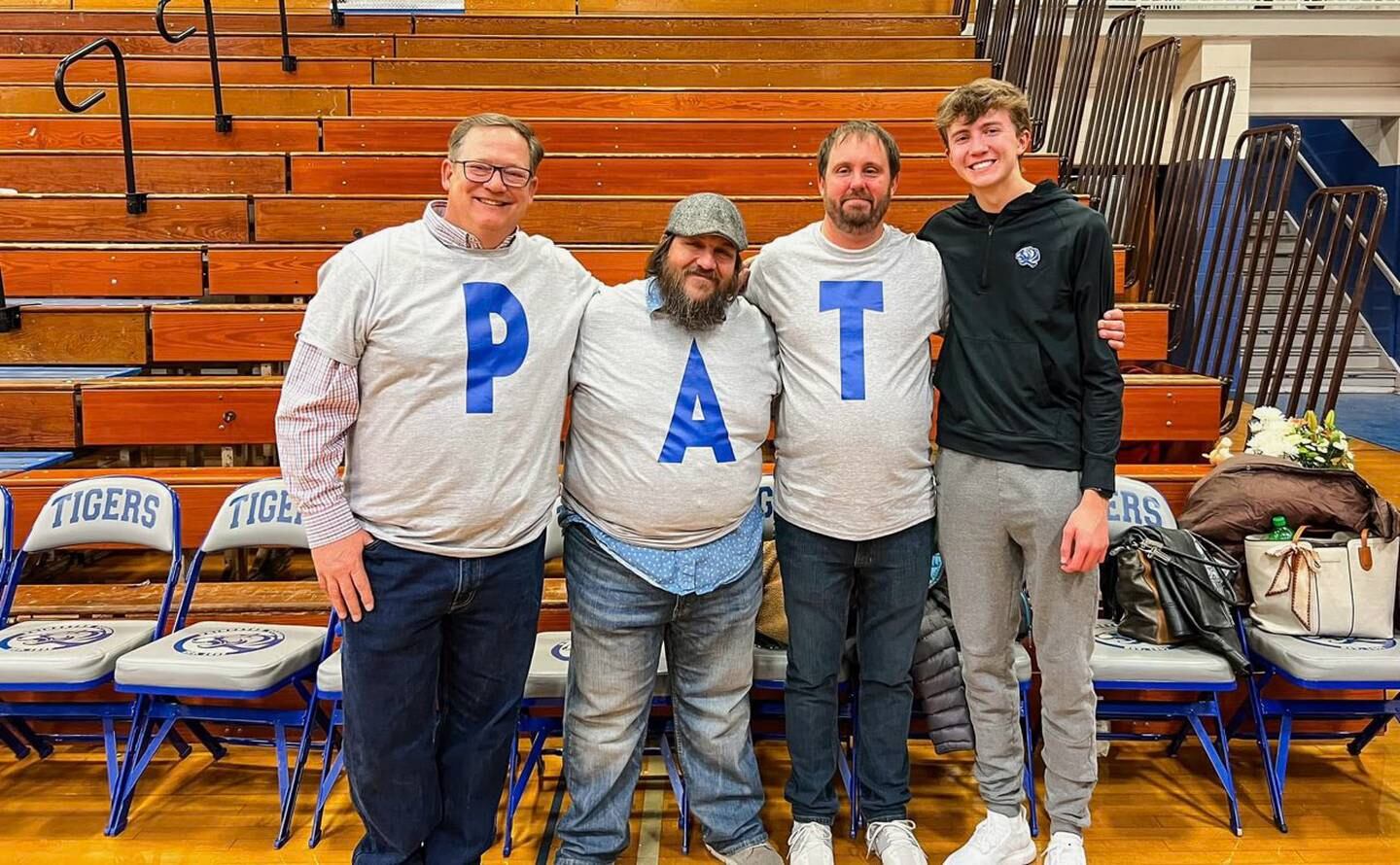 Trent Goodale (P), Jason Allen (A) and Ian Cardosi (T) came out to support PHS junior Jackson Mason, whose dad, Pat, passed away suddenly on Monday, at Friday's Tiger basketball game.
