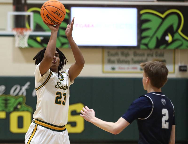 Crystal Lake South's David Mcfadden shoots the ball over Cary-Grove's AJ Berndt during a Fox Valley Conference boys basketball game on Friday, Jan. 23, 2026, at Crystal Lake South High School.