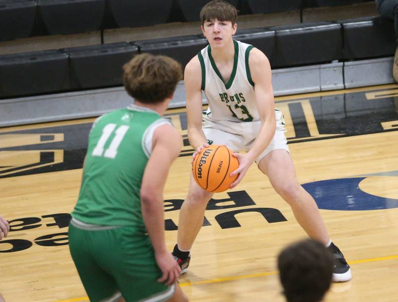 St. Bede's Graham Ross looks to pass the ball over Dwight's Joey Starks during the Tri-County Conference Tournament on Tuesday, Jan. 27, 2026 at Putnam County High School.