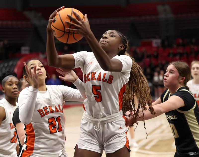 DeKalb's Me'She Eubanks rebounds a Sycamore shot Friday, Jan. 30, 2026, during their game in the FNBO Challenge in the Convocation Center at Northern Illinois University in DeKalb.