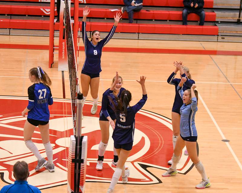 Nazareth Academy celebrates a point while taking on Geneva during the sectional title game on Thursday Nov. 6, 2025, held at Timothy Christian Hgih School.