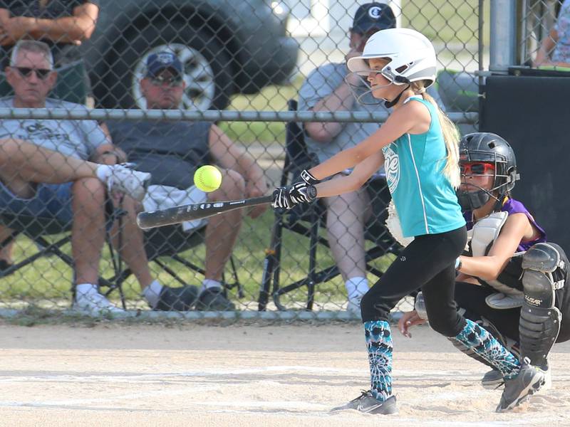 Edge's Kynzlee Jerde gets a hit against Warriors during the Ottawa Girls Fastpitch Association 11U City Championship on Wednesday July 2, 2025 at Peck Park in Ottawa.
