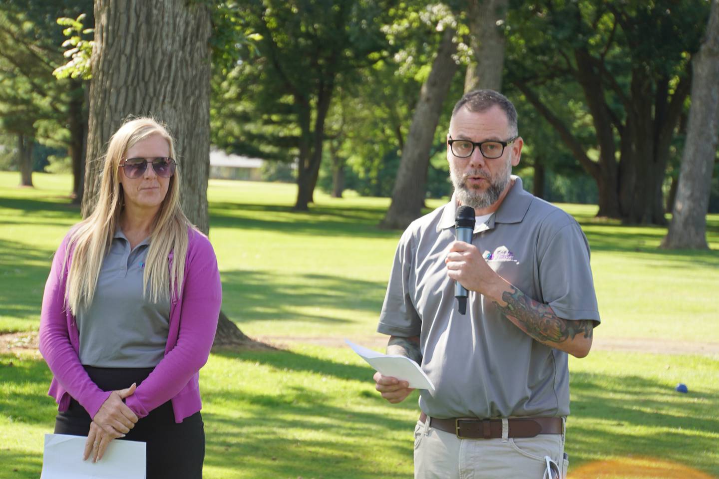 RACF Board President and Rochelle City Manager Jeff Fiegenschuh (right) kicked off the event with a speech ahead of the shotgun start. RACF Executive Director Emily Anaya is shown at left.