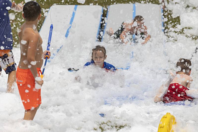 Dixon Park District SPARK campers were treated Thursday, June 15, 2023 to a foam machine on the grounds of The Facility as part of the day camp.