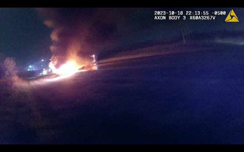 A still from a Joliet police body camera video of the crash where a semitrailer rescued another driver on Wednesday, Oct. 18, 2023, in Joliet Township.