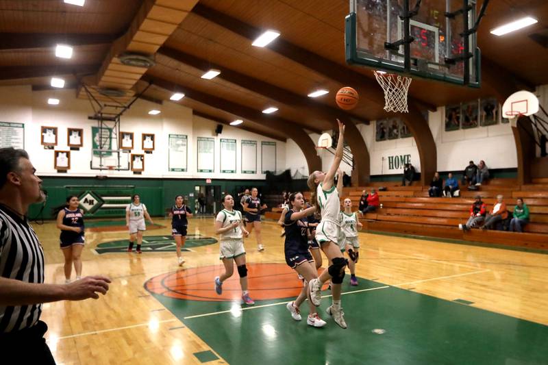 Alden-Hebron's Olivia Klein finish a fast break during a nononference girls basketball game against Woodlands Academy on Thursday, Jan. 29, 2026, at Alden-Hebron High School in Hebron.