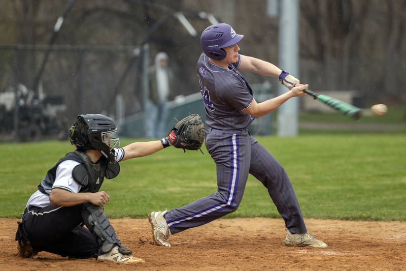 Dixon’s Braxton Bruce drives a ball against Rock Falls Thursday, April 9, 2026.