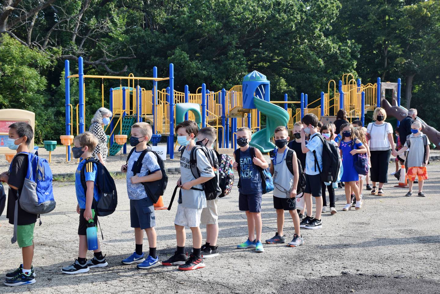 Students line up to enter North Elementary School in Sycamore for the first day of the 2021-2022 school year on Wednesday.