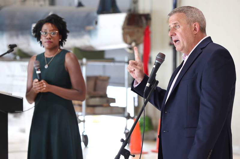 DeKalb Mayor Cohen Barnes lays out the ground rules for questions of U.S. Rep. Lauren Underwood, D-Naperville, Tuesday, Aug. 23, 2022, during a town hall meeting in one of the hangers at the DeKalb Taylor Municipal Airport.