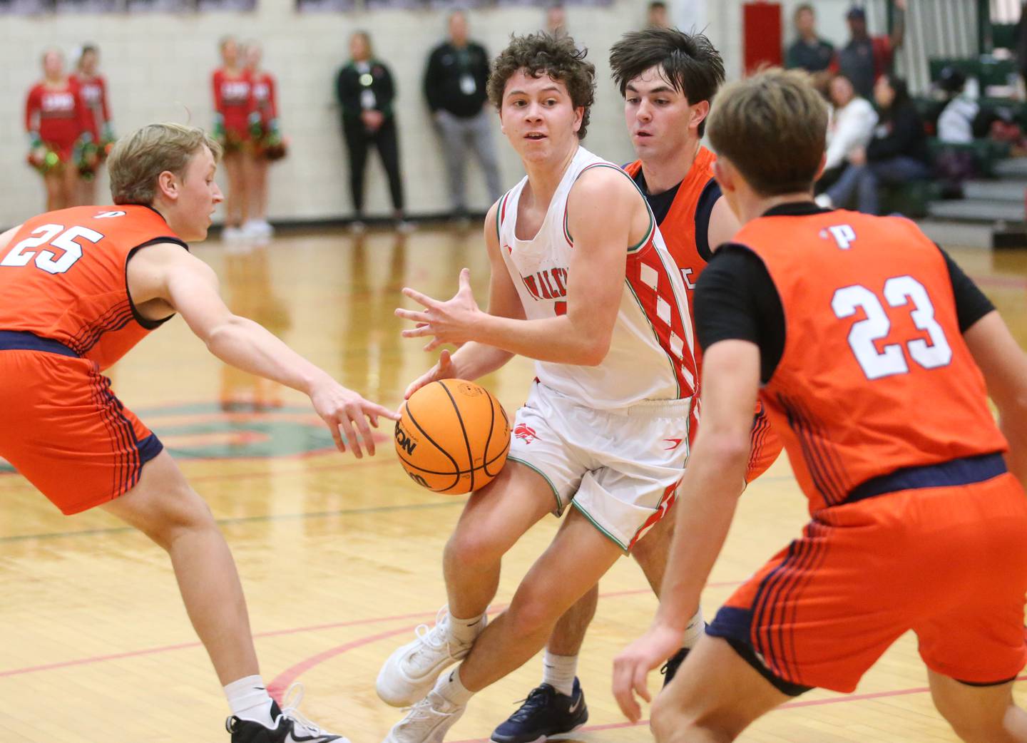L-P's Mikey Hartman has the ball stripped away by Pontiac's Aden Brumme on Tuesday, Dec. 17, 2024 in Sellett Gymnasium at L-P High School.