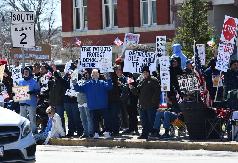 Demonstrators displayed a wide variety of signs and attire during the No Kings rally on Saturday, March 28, 2026, in downtown Oregon, Illinois.