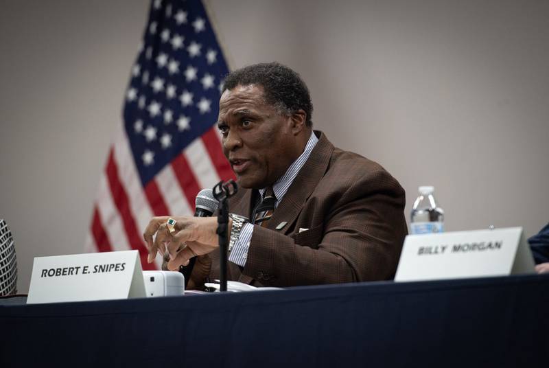 Kankakee County Board member Robert Ellington-Snipes answers a question during the 79th State Representative Democratic Party candidate debate on Feb. 27.
