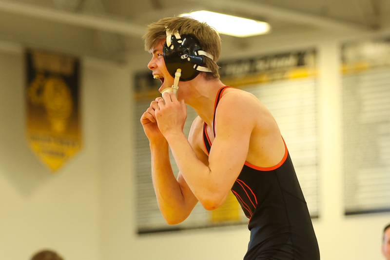 Lincoln-Way West’s Cameron Knepper celebrates his win by fall against Joliet West’s Nice Harris in the 152lb 1st place match at the Class 3A Joliet West Regionals. Saturday, Feb. 5, 2022, in Joliet.
