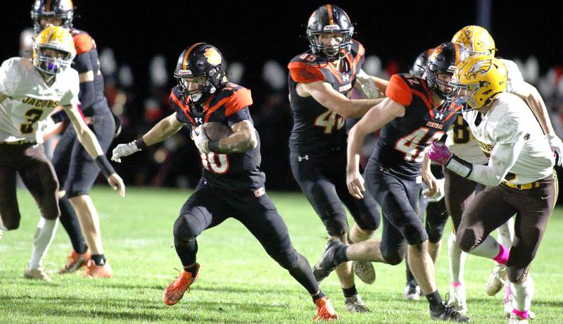 Crystal Lake Central’s Griffin Buehler runs the ball against Jacobs in varsity football at Metcalf Field on the campus of Crystal Lake Central Friday night.