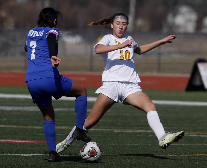 Jacobs' Gabby Wojtarowicz tries to kick the ball away from Larkin’s Mia Montesinos during a nonconference Huntley Invite girls soccer match Tuesday, March 28, 2023, at Huntley High School.