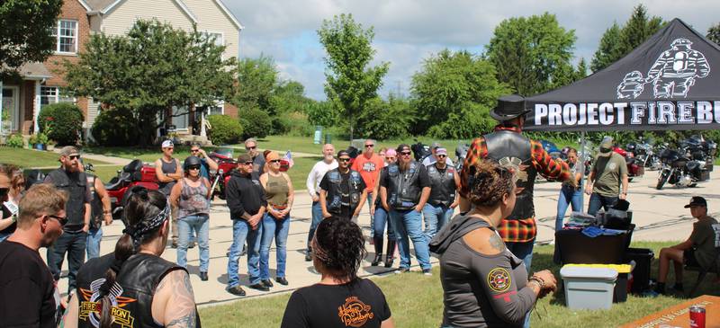 35 bikes with a total of 42 people line up, waiting to support Project Fire Buddies in Sycamore in July 2025.