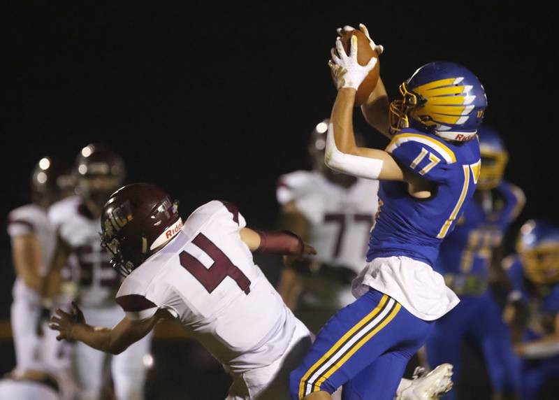 Johnsburg's Kaeden Frost intercepts apass intended for Marengo’s Mason Lampe during a Kishwaukee River Conference football game on Friday, Sept. 15, 2023, at Johnsburg High School.