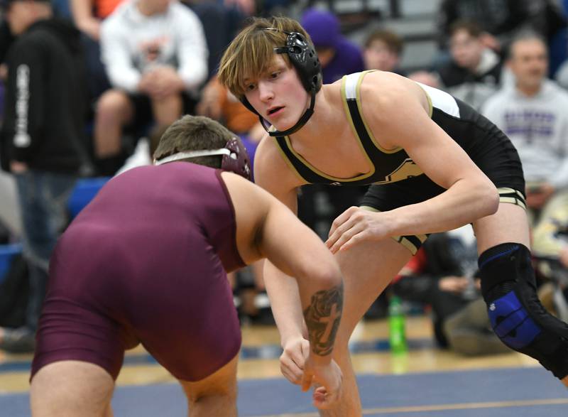 Polo-Eastland's Wyatt Doty (right) wrestles Dakota's Phoenix Blakely for the championship at 132 pounds at the 1A Polo Wrestling Regional held in Lanark at Eastland High School on Saturday, Feb. 4.
